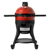 Barbecue kamado au charbon Kamado Joe Konnected Joe, modèle connecté rouge sur chariot roulant avec tablettes latérales rabattables
