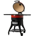 Kamado Joe Konnected Joe ouvert montrant ses grilles de cuisson en acier inoxydable et son foyer en céramique